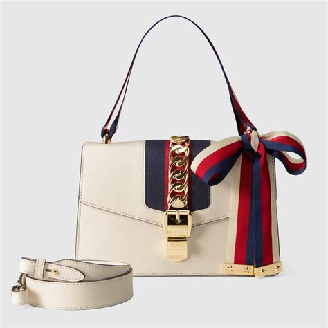 white and gold gucci purse|vintage Gucci white shoulder bag.